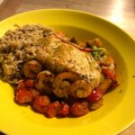 Zalm en scampi met ovengroentjes, rijst en groene curry